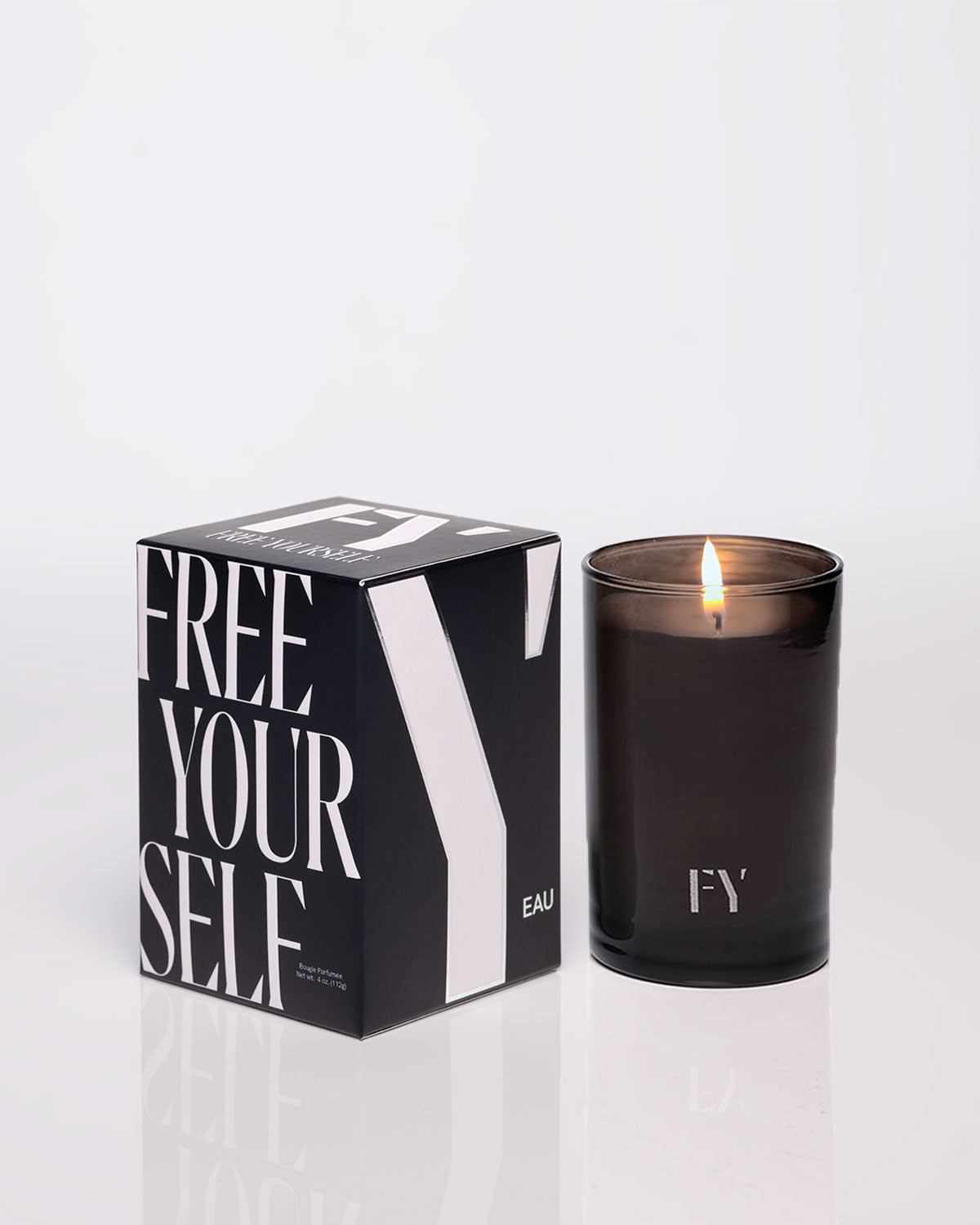 Free Yourself 4oz EAU candle with box & lit vessel