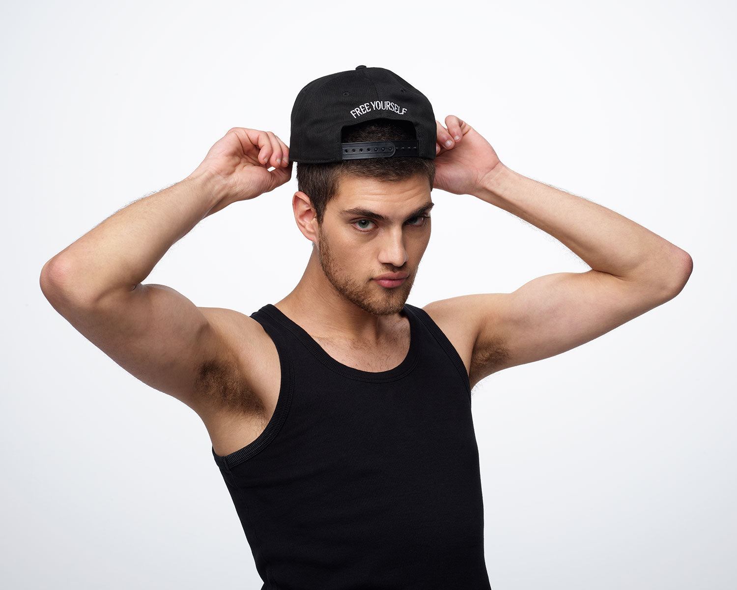 Man wearing FREE YOURSELF 5-panel hat