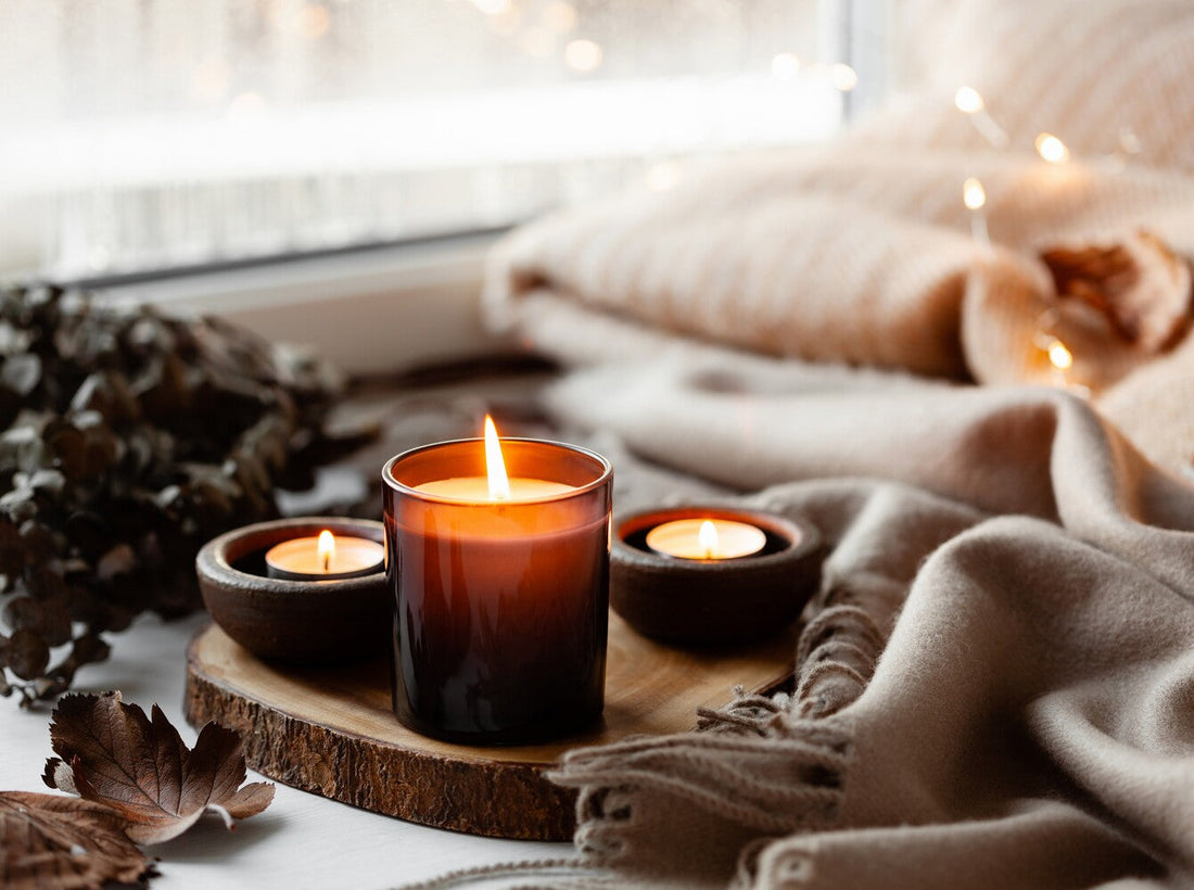 cozy setup of candles in glass holders to show whether candles do expire