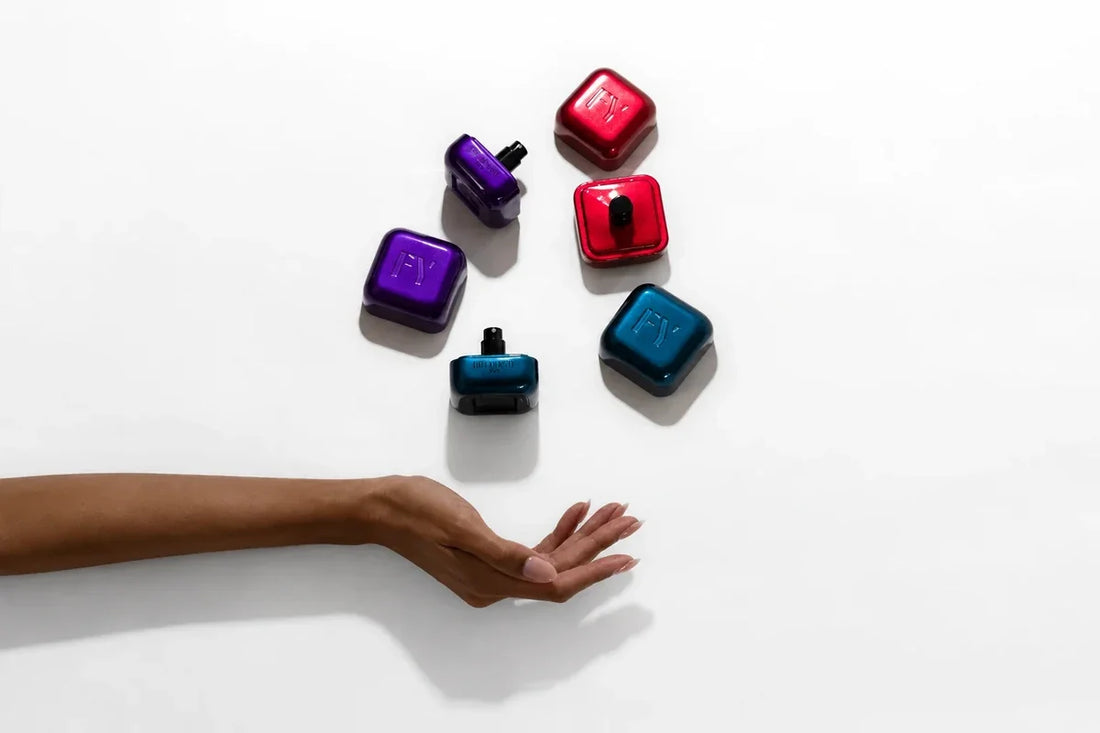Free Yourself Mindful perfume cubes above an open hand