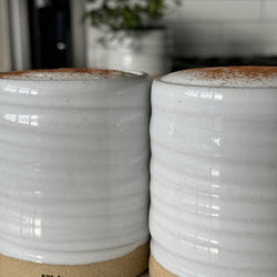 Two 12oz reusable mugs with latte