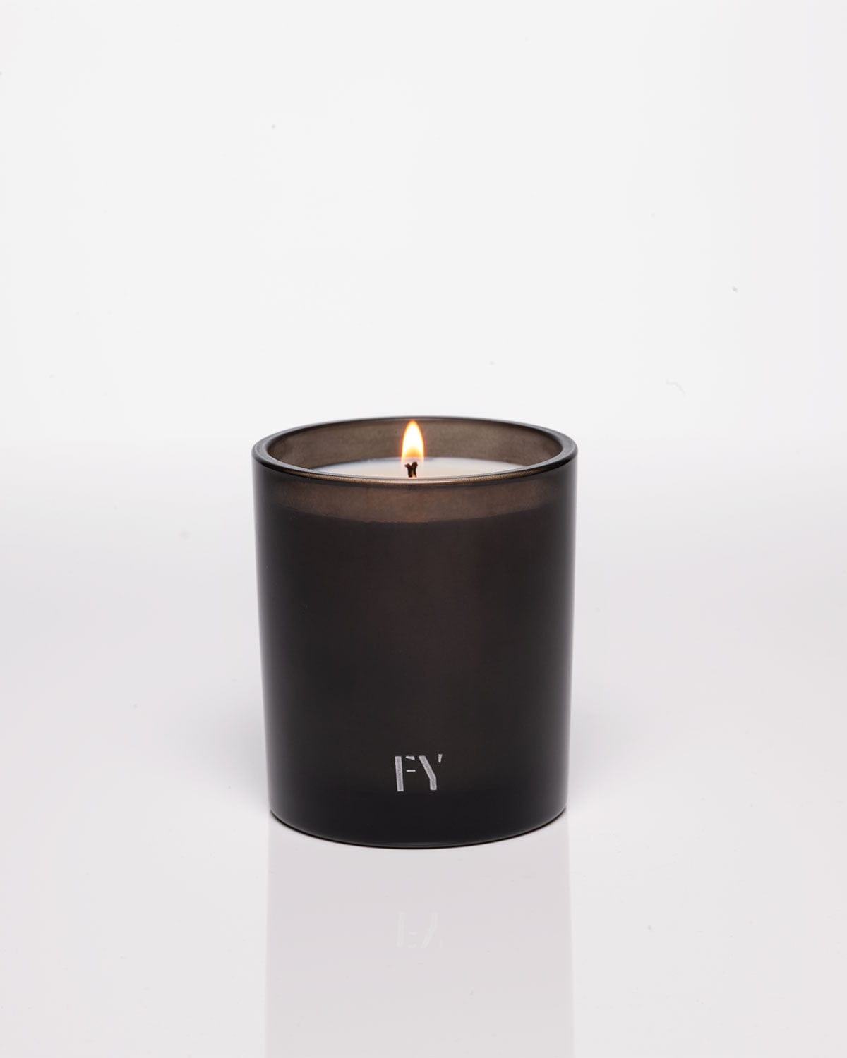 FREE YOURSELF 10oz EAU candle in dark glass vessel