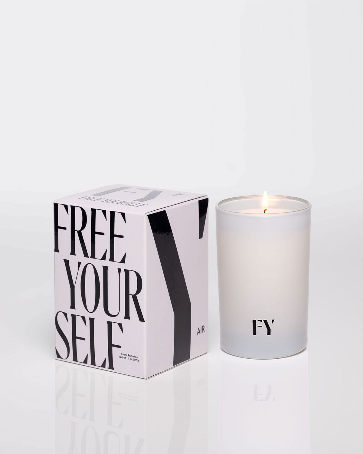 Free Yourself 4oz lit candle in carton vessel