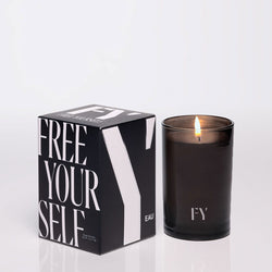 Free Yourself 4oz EAU candle with box & lit vessel