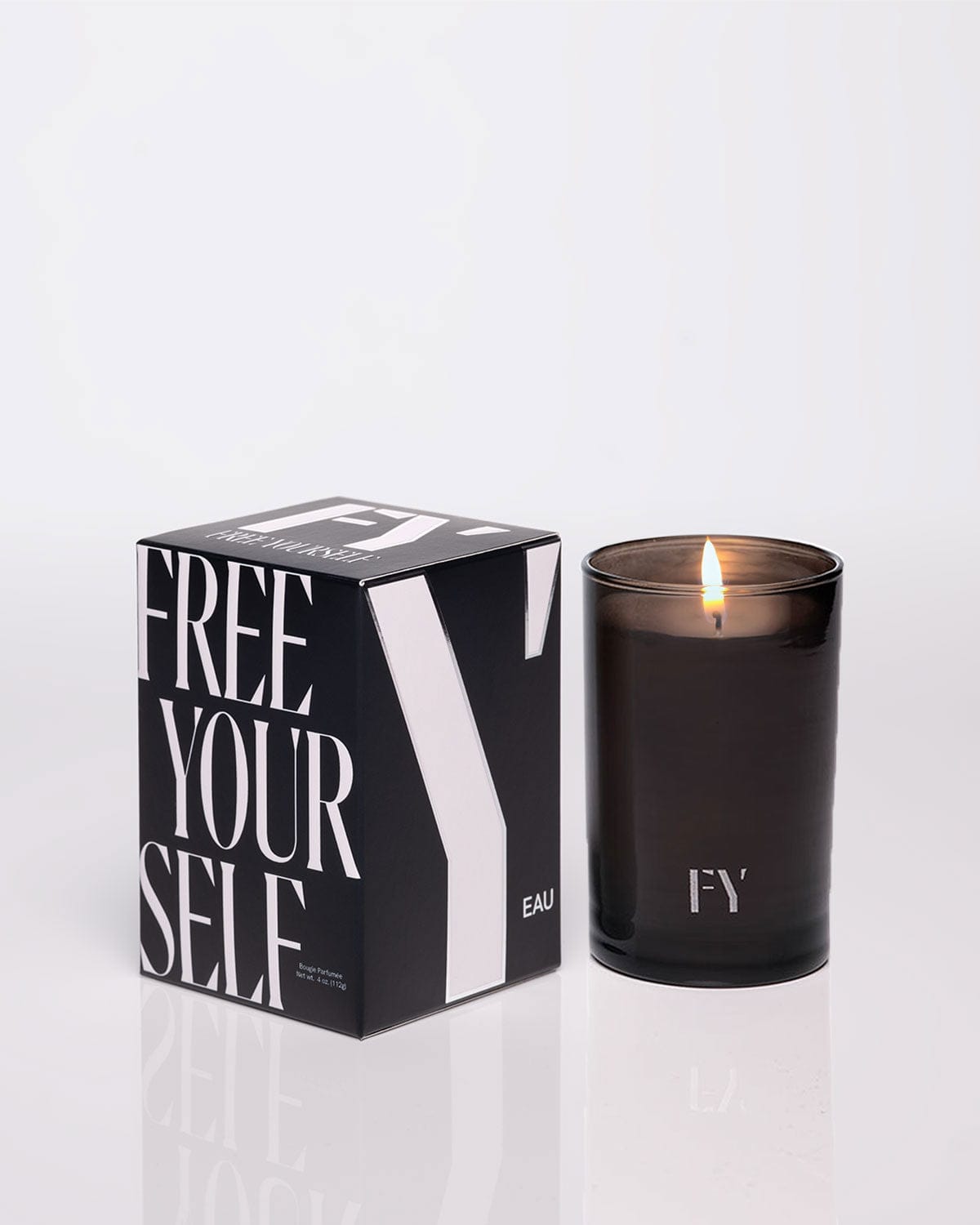 Free Yourself 4oz EAU candle with box & lit vessel
