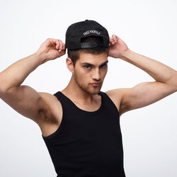 Man wearing FREE YOURSELF 5-panel hat