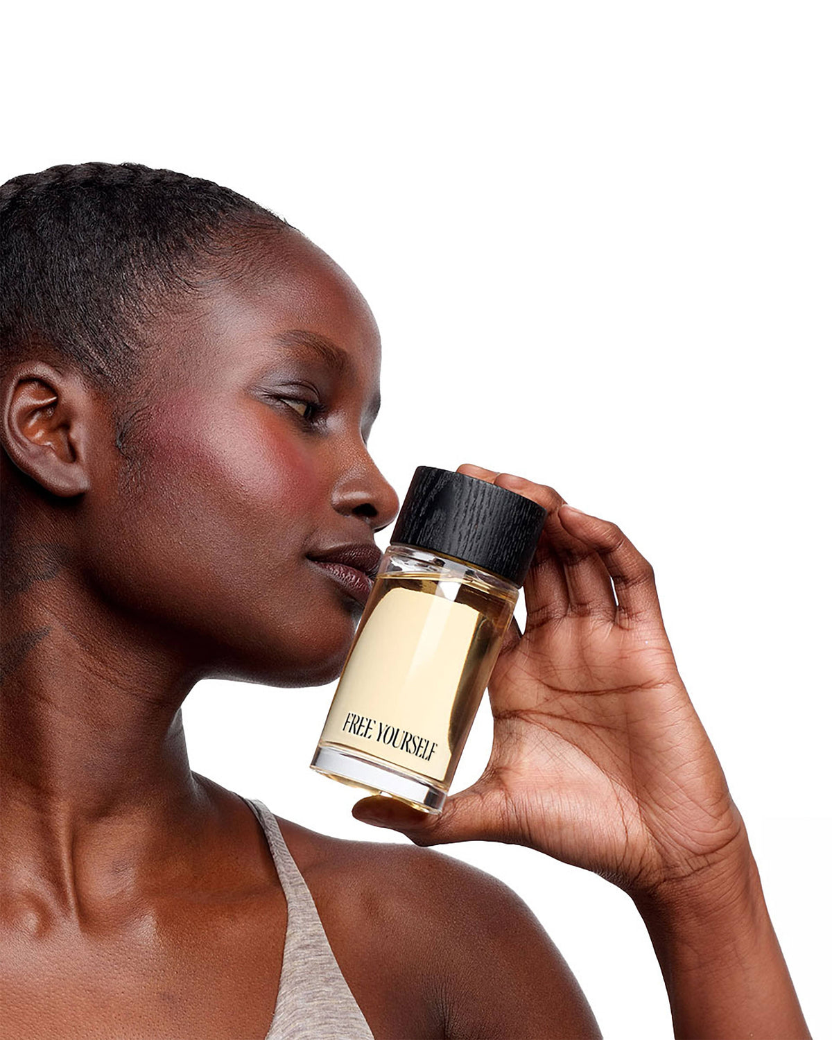FY New Black Woman with Free Yourself perfume.